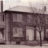 <p><strong>Colonial Revival</strong>: A later example of the style. North facade of Non-Commissioned Officers&#39; Quarters (Building 107), built 1930, looking south, ca. 1939.</p>